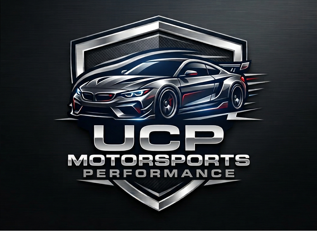 A stylized metallic shield logo featuring a dark sports car and the text 'UCP MOTORSPORTS PERFORMANCE' on a dark gray background.